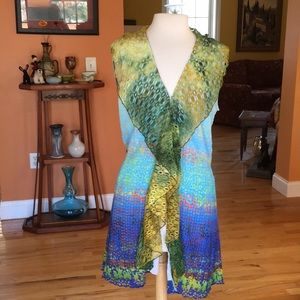 Sleeveless boho long vest. Shades of blue, green.